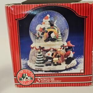 St. Nicholas Square  musical Christmas  snow Globe with Penguins
